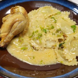 1/2 Coquelet rôti et pommes de terre,gratin de courgette.